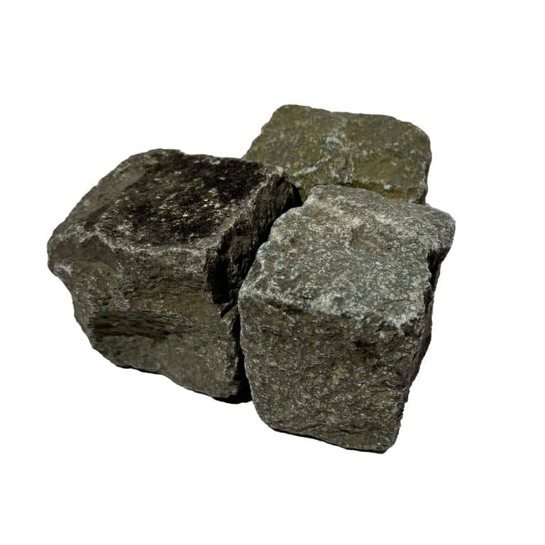 Oblique image for Reclaimed European Porphyry Cobblestones - Worn Cubes. The surface finish shown is . Dominant colors shown are black, brown and gray. The color mix creates a warm feeling.