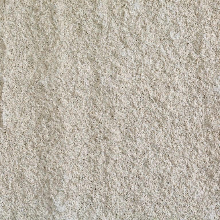 Color/Finish variation image for Silver Shadow Limestone - Pavers. The surface finish shown is sand blasted. The dominant color shown is gray; with beige, white, tan and cream secondaries. The color mix creates a warm feeling. Speckled and cloudy color patterns.