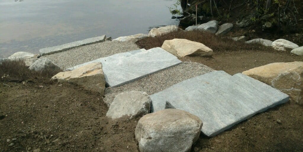 Application image for Liberty Hill Granite - Monolithic Steps. The image shows this product being used in a monolithic steps application. This is a building and landscape stone for indoor and outdoor commercial and residential applications. Suitable for general use, freeze-thaw conditions, low heat absorption surfaces and low slipperiness surfaces situations. Relatively moderate in price.