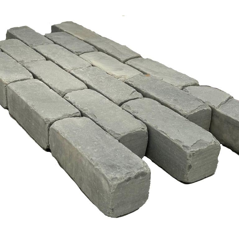 Application image for Blue/Gray Bluestone - Cobblestone Pavers. The surface finish shown is tumbled. The dominant color shown is gray.