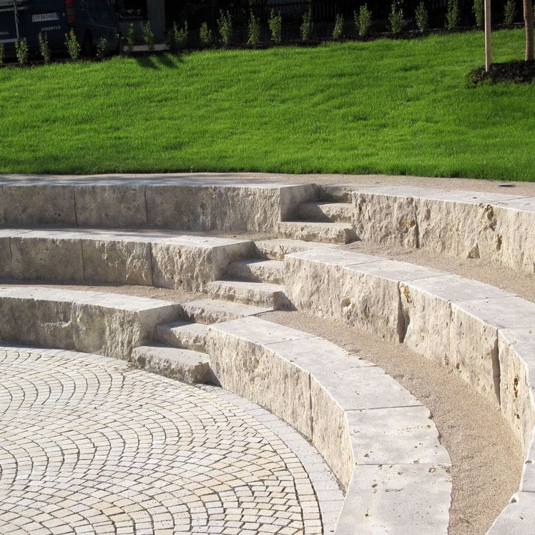 Application image for Bavarian Dolomite - Gray - Benches &amp; Seating. The image shows this product being used in a seating &amp; benches application. This is a building and landscape stone for indoor and outdoor commercial and residential applications. Suitable for general use, freeze-thaw conditions and low heat absorption surfaces situations. Moderate to higher on the price spectrum.