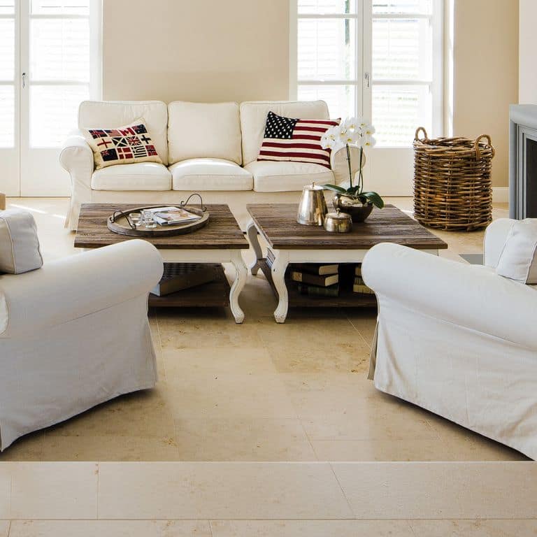 Feature image for Bavarian Limestone - Beige - Interior Floor. The image shows this product being used in an interior floor application. Dominant colors shown are beige and tan; with brown, orange/rust, white and cream secondaries. Exhibits "movement" and the color mix creates a warm feeling. Speckled and blotched color patterns.