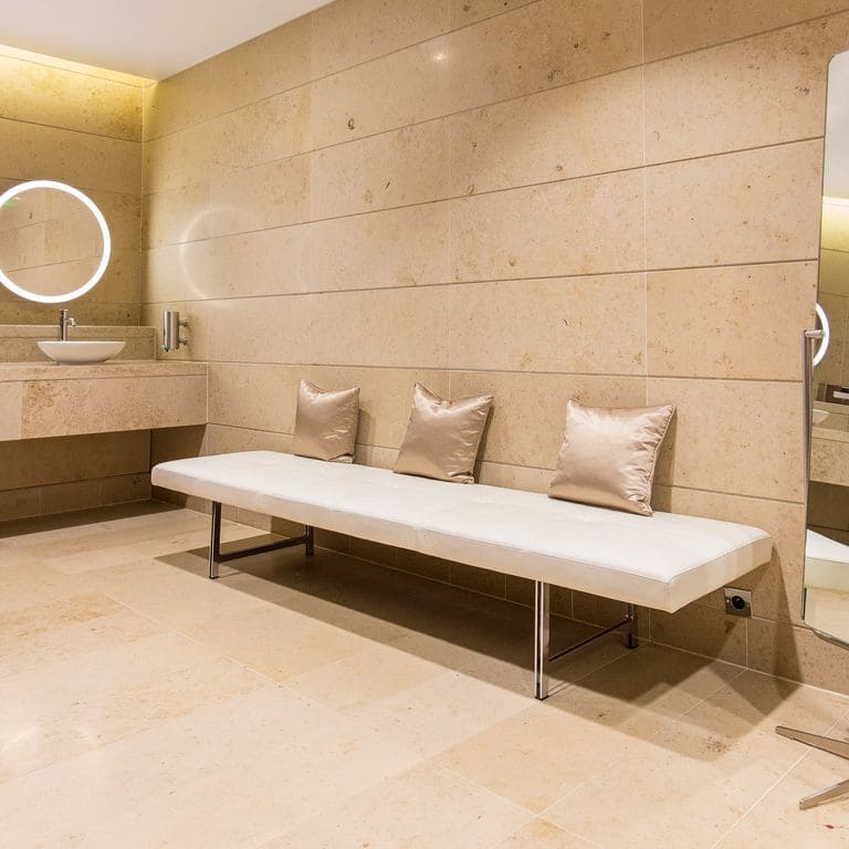Application image for Bavarian Limestone - Beige - Interior Floor. The image shows this product being used in an interior floor application. Dominant colors shown are beige and tan. The color mix creates a warm feeling.