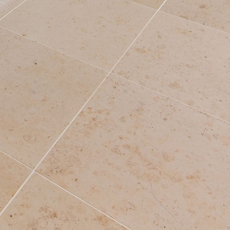 Application image for Bavarian Limestone - Beige - Interior Floor. The image shows this product being used in an interior floor application. Dominant colors shown are beige and tan. The color mix creates a warm feeling.