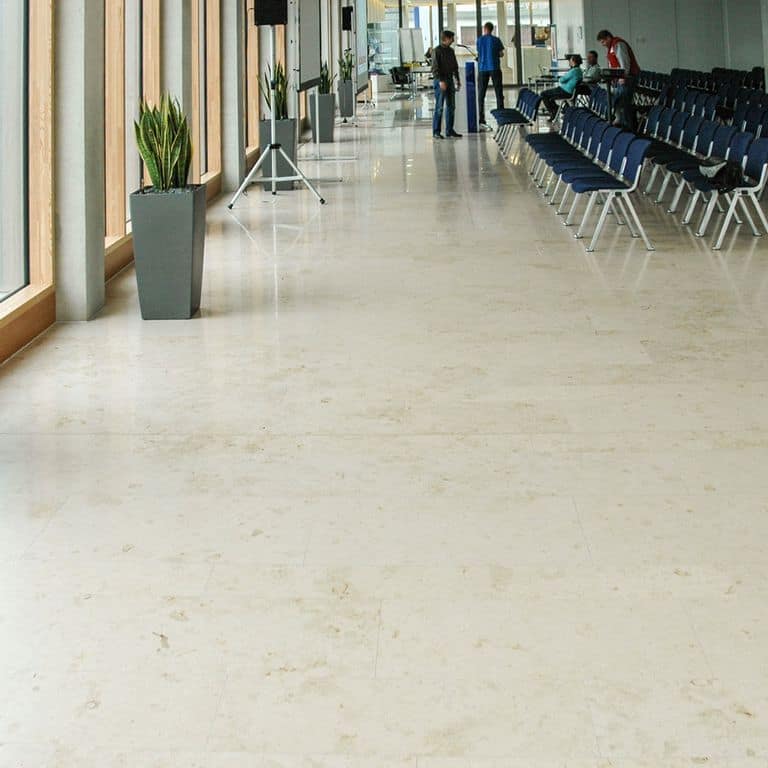 The image shows this product being used in an interior floor application.