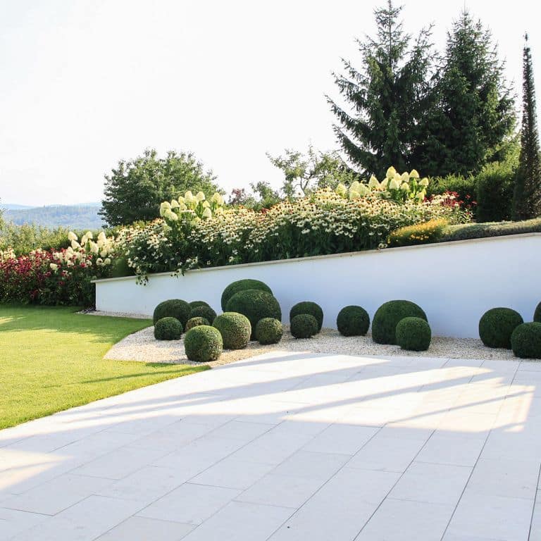 Application image for Bavarian Beige Limestone - Pavers. The image shows this product being used in a patio pavers application. The dominant color shown is beige. The color mix creates a warm feeling.