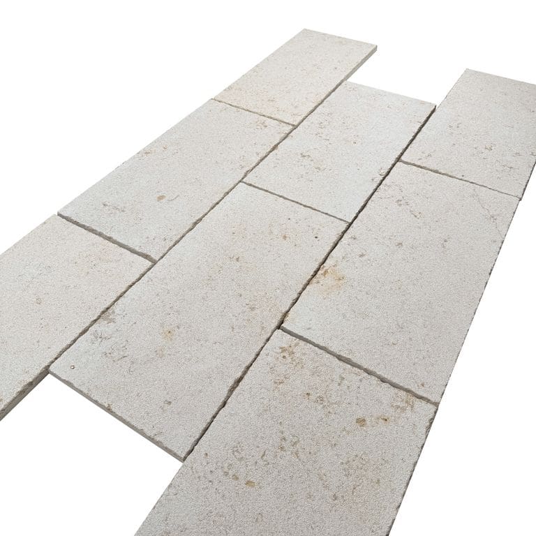 Color/Finish variation image for Bavarian Beige Limestone - Pavers. The surface finish shown is bush hammered. Dominant colors shown are tan and cream. The color mix creates a warm feeling.