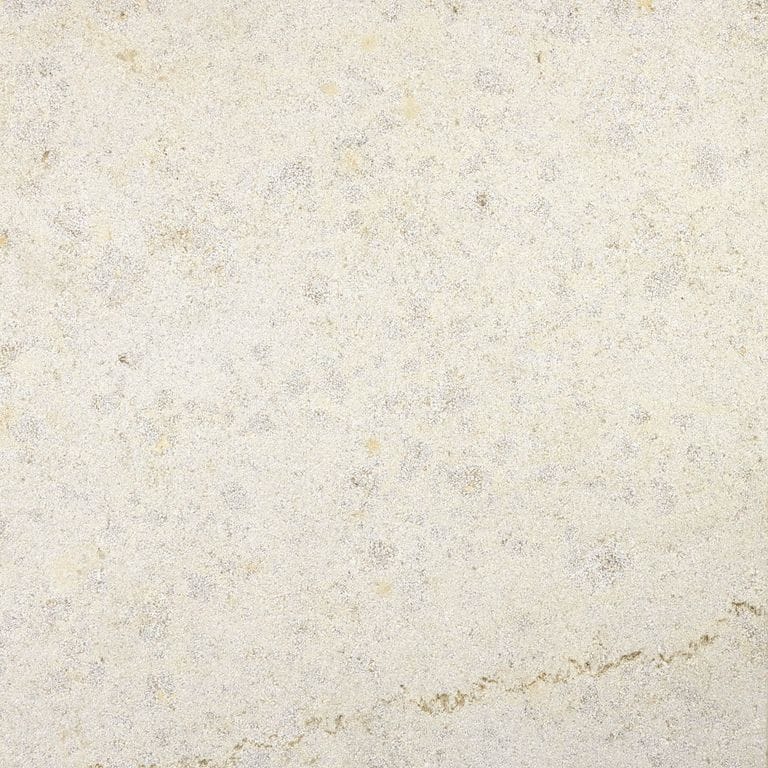 Color/Finish variation image for Bavarian Limestone Gala - Beige - Pool Coping. The surface finish shown is sand blasted. Dominant colors shown are beige and cream; with gray, white and tan secondaries. The color mix creates a warm feeling. Random, coarse speckled and cloudy color patterns.