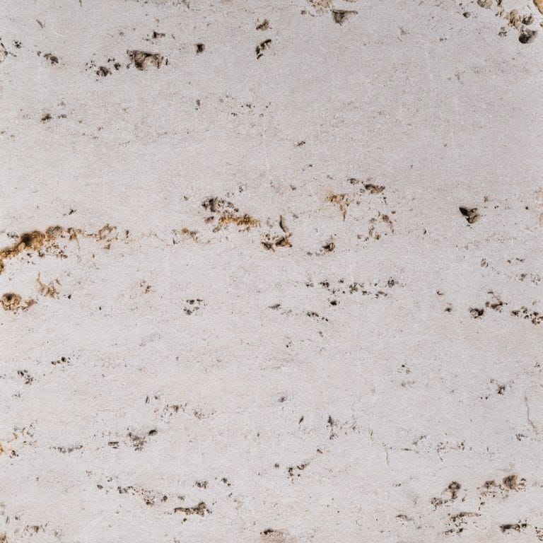 Color/Finish variation image for Bavarian Travertine - Beige - Interior Floor. The surface finishes shown are honed and tumbled. Dominant colors shown are beige, gray and white; with brown, pink and cream secondaries. The color mix creates a warm feeling. Random color pattern.