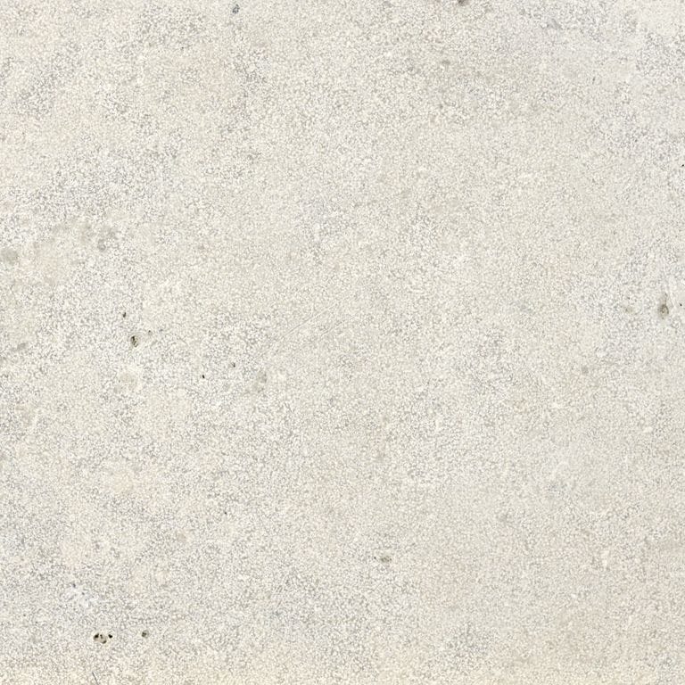 Color/Finish variation image for Bavarian Gray Limestone - Pool Coping. The surface finish shown is sand blasted. Dominant colors shown are beige, gray, white and cream. Speckled color pattern.