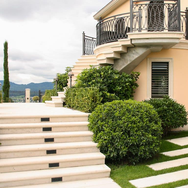 Feature image for Bavarian Limestone Gala - Beige - Treads. The image shows this product being used in a treads application. Dominant colors shown are beige, white and cream. The color mix creates a warm feeling. Solid, regular and cloudy color patterns. Contains mineral inclusions.