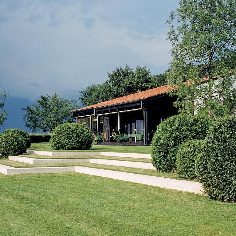 Application image for Bavarian Beige Limestone - Steps &amp; Treads. The image shows this product being used in a monolithic steps application. Dominant colors shown are beige, white and cream. Solid color pattern.