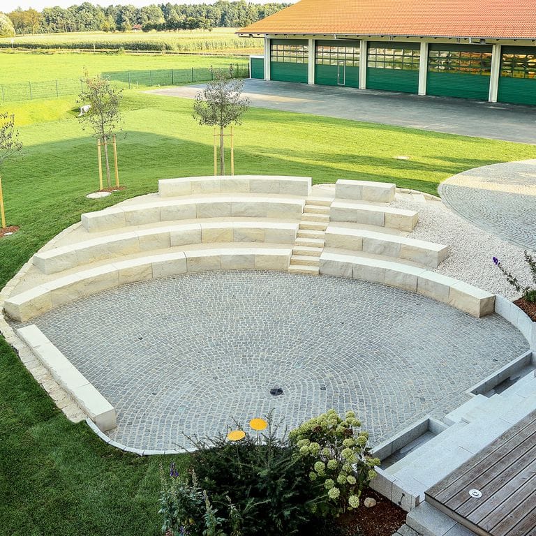 Application image for Bavarian Limestone Gala - Beige - Benches &amp; Seating. The image shows this product being used in a seating &amp; benches application. This is a building and landscape stone for outdoor commercial and residential applications. Suitable for general use, freeze-thaw conditions and low heat absorption surfaces situations. Moderate to higher on the price spectrum.