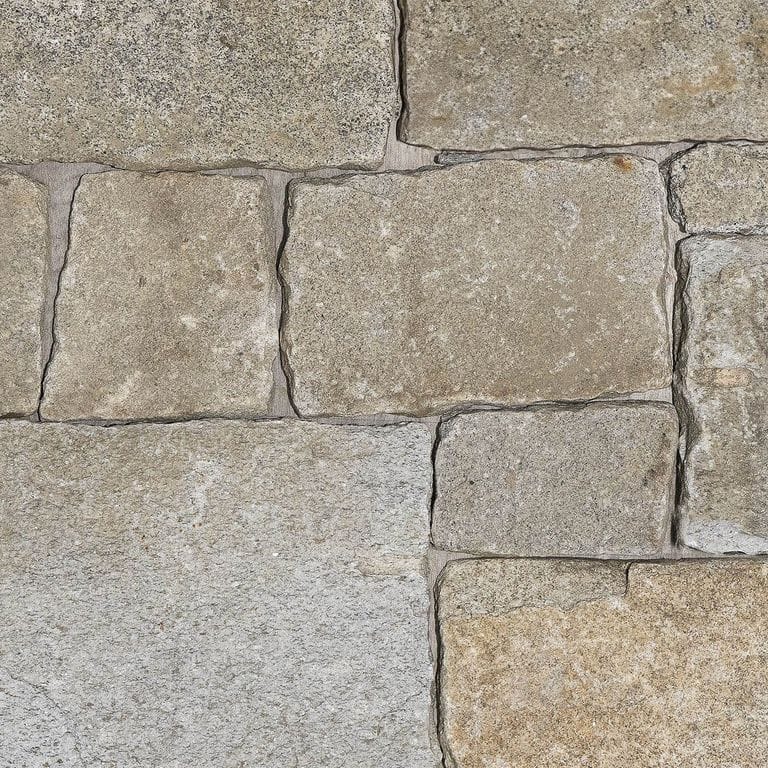Color/Finish variation image for Reclaimed Granite - Thin Veneer. The surface finish shown is . Dominant colors shown are gray and tan. The color mix creates a warm feeling.