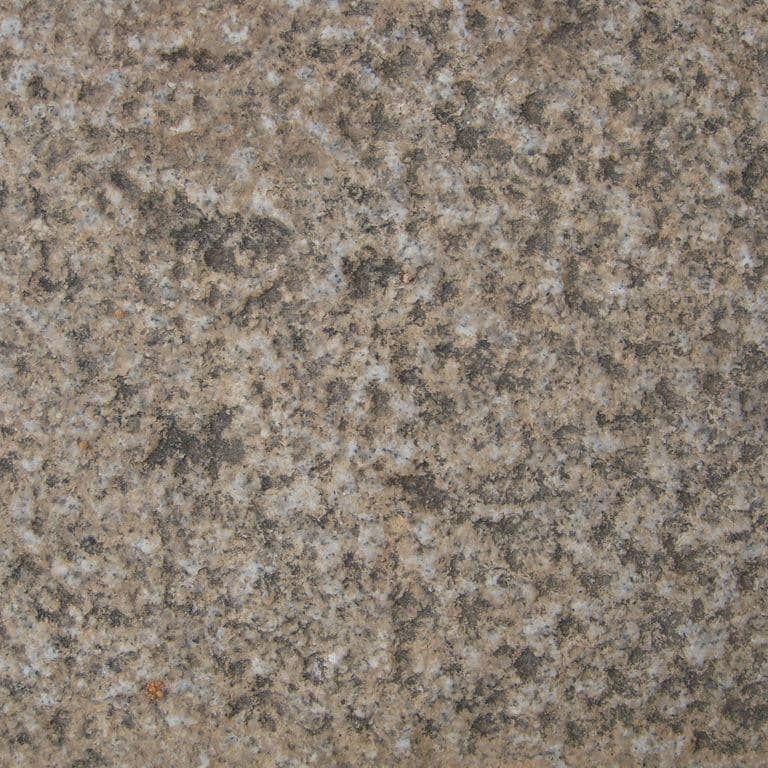 Color/Finish variation image for Reclaimed Footworn Granite Coping. The surface finishes shown are coarse free form bush hammered, weathered and worn. Dominant colors shown are brown and gray; with green, orange/rust, purple and tan secondaries. The color mix creates a warm feeling. Coarse speckled color pattern.