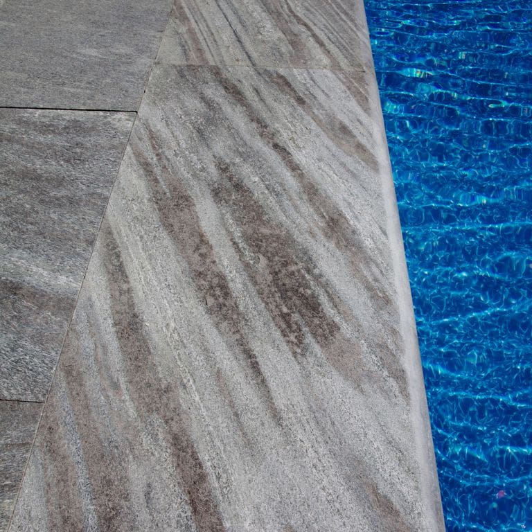 The image shows this product being used for pool coping, pool deck pavers and .