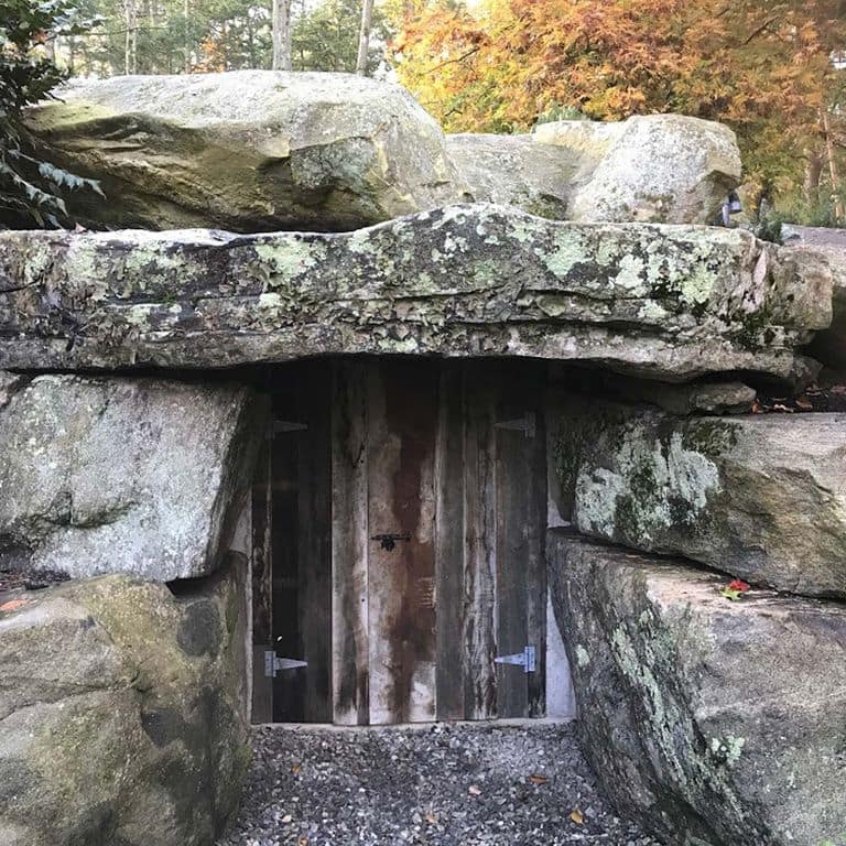 Application image for New England Fieldstone Boulders &amp; Ledgestone - Jumbo Boulders. The image shows this product being used in an architectural elements application. The surface finish shown is weathered. The dominant color shown is gray. The color mix creates a warm feeling.