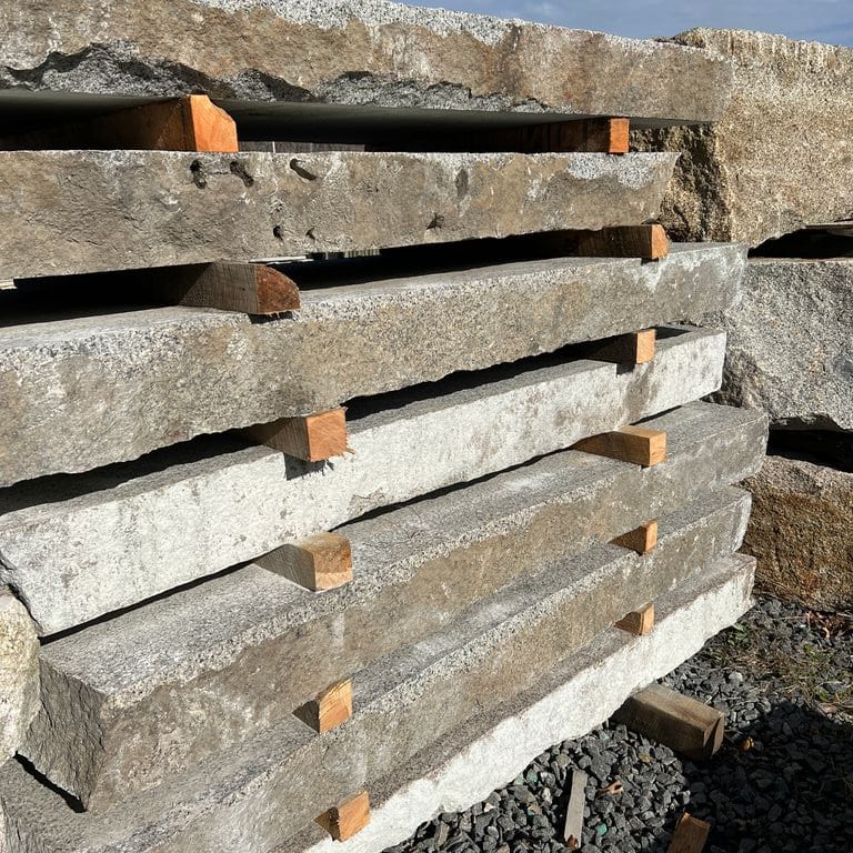 Application image for Granite - Reclaimed Landings - Sawn and Flamed Top, Live Edge. The surface finish shown is flamed. The dominant color shown is gray. The color mix creates a warm feeling.