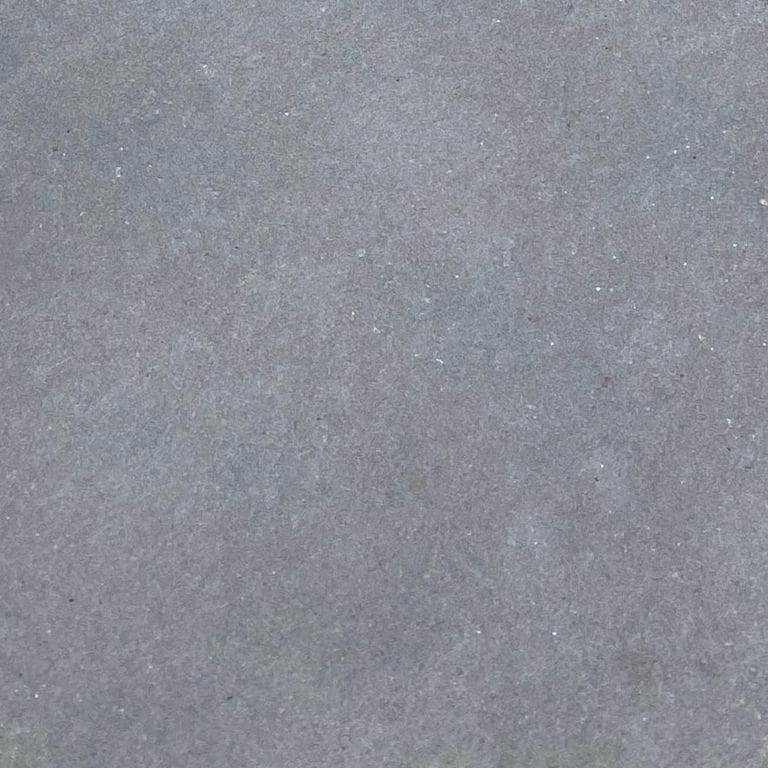 Swatch image for Bluestone Flamed Surface Blue/Gray Fire Feature. The surface finish shown is flamed. Dominant colors shown are blue and gray. The color mix creates a cool feeling. Solid color pattern.