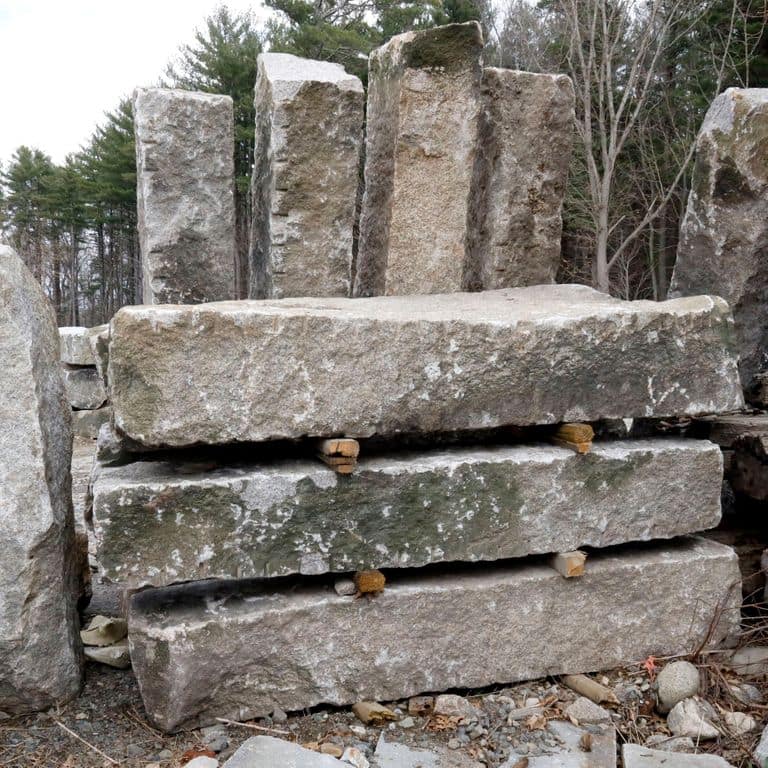 Application image for Granite - Reclaimed - Jetty Stones. The surface finish shown is . The dominant color shown is gray; with beige, brown, green, orange/rust, purple, white and tan secondaries. The color mix creates a warm feeling. Speckled color pattern.