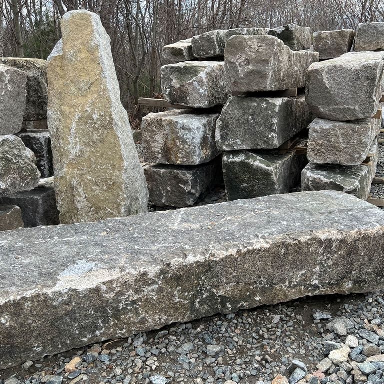 Application image for Granite - Reclaimed - Jetty Stones. The surface finish shown is . The dominant color shown is gray; with beige, black, brown, green, orange/rust, purple, white, tan and cream secondaries. Speckled color pattern.