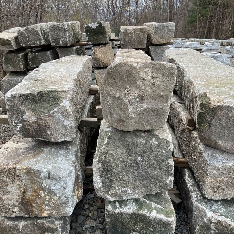 Application image for Granite - Reclaimed - Jetty Stones. The surface finish shown is . The dominant color shown is gray; with beige, black, blue, brown, green, purple, white and tan secondaries. The color mix creates a cool feeling. Fine speckled color pattern.