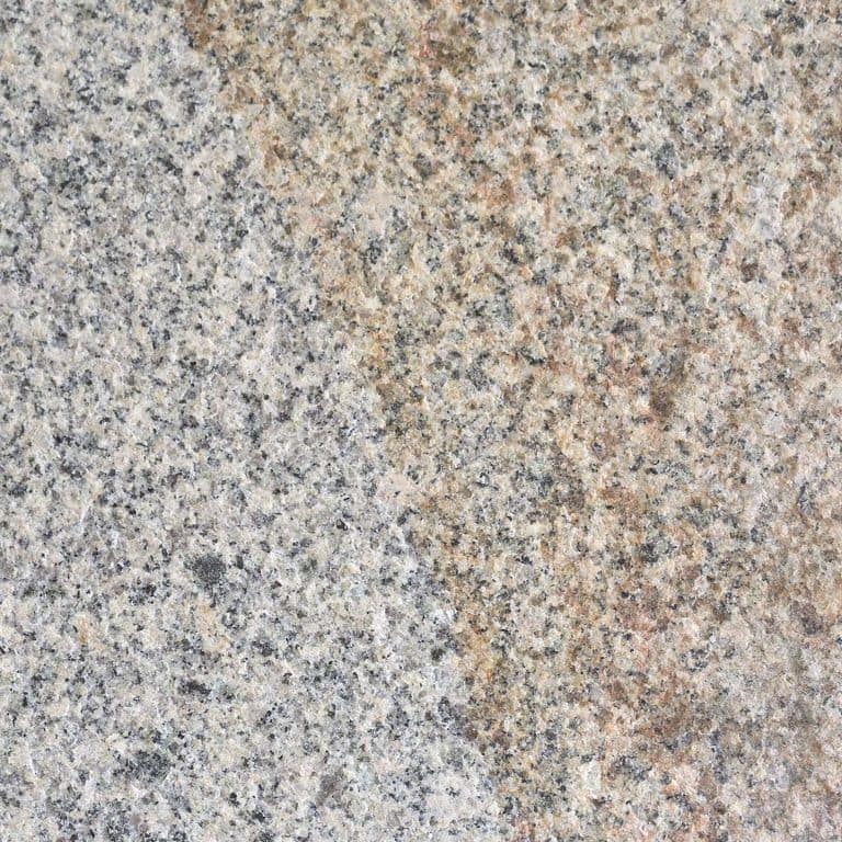 Color/Finish variation image for Cape Neddick Full Color Granite - Flamed Top Live Edge Steps. Dominant colors shown are beige and gray; with orange/rust, pink, white, tan and cream secondaries. Exhibits "movement" and the color mix creates a warm feeling. Streaked, speckled and blotched color patterns.