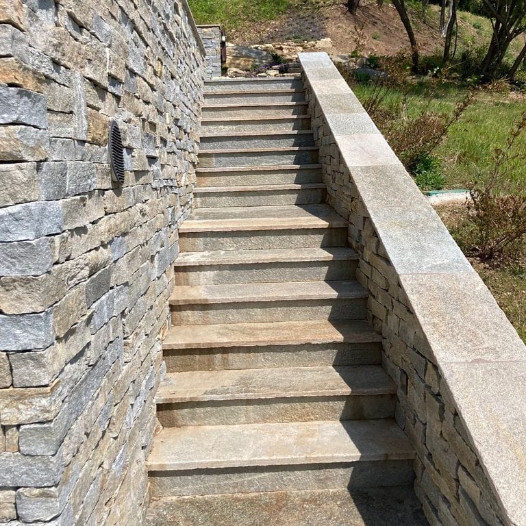 Application image for Pietra Italia Full Color Gneiss - Treads. The image shows this product being used in a treads application. Dominant colors shown are beige, gray and tan. The color mix creates a warm feeling.