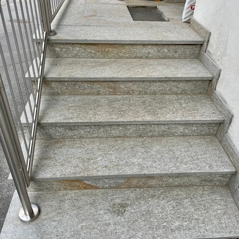 Application image for Pietra Italia Gneiss - Treads. The image shows this product being used in a treads application. Dominant colors shown are gray and tan. The color mix creates a warm feeling.