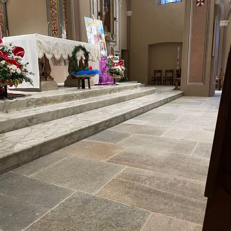 Application image for Pietra Italia Gneiss - Natural Cleft &amp; Brushed Interior Floor. The image shows this product being used in an interior floor application. Dominant colors shown are gray and tan. The color mix creates a warm feeling.