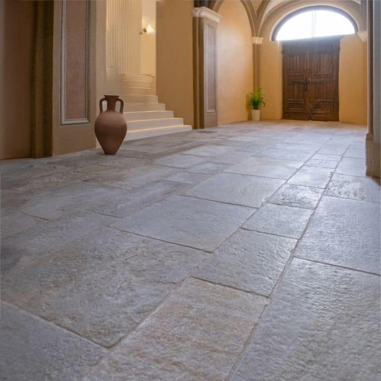 Application image for Pietra Italia Gneiss - Natural Cleft &amp; Brushed Interior Floor. The image shows this product being used in an interior floor application. The dominant color shown is gray. The color mix creates a warm feeling.