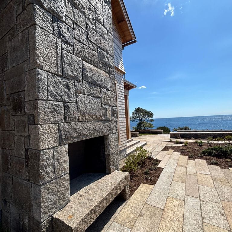 Application image for Reclaimed Granite Curbstone - Full Bed Veneer. The image shows this product being used in a full bed veneer application. The surface finish shown is . The dominant color shown is gray. The color mix creates a cool feeling.