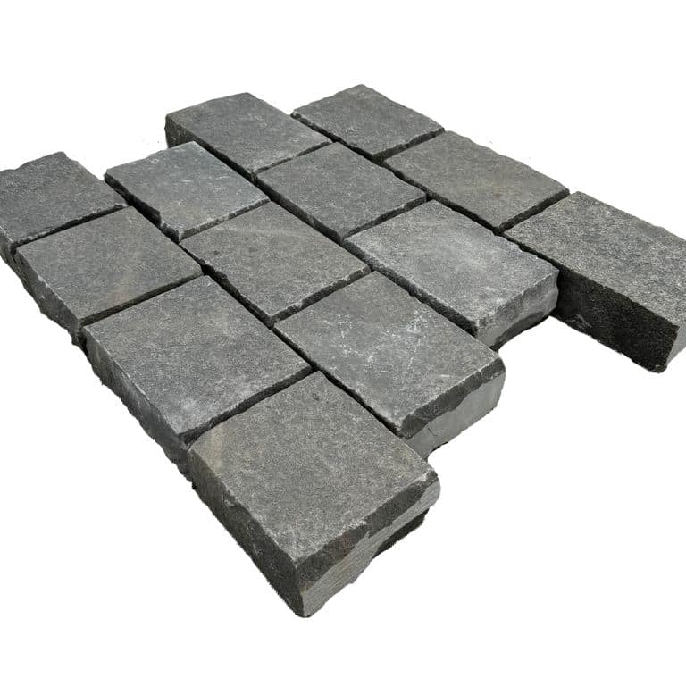 Application image for Limestone - Polar Gray - Cobblestones. The surface finish shown is flamed. Dominant colors shown are black and gray. The color mix creates a cool feeling.