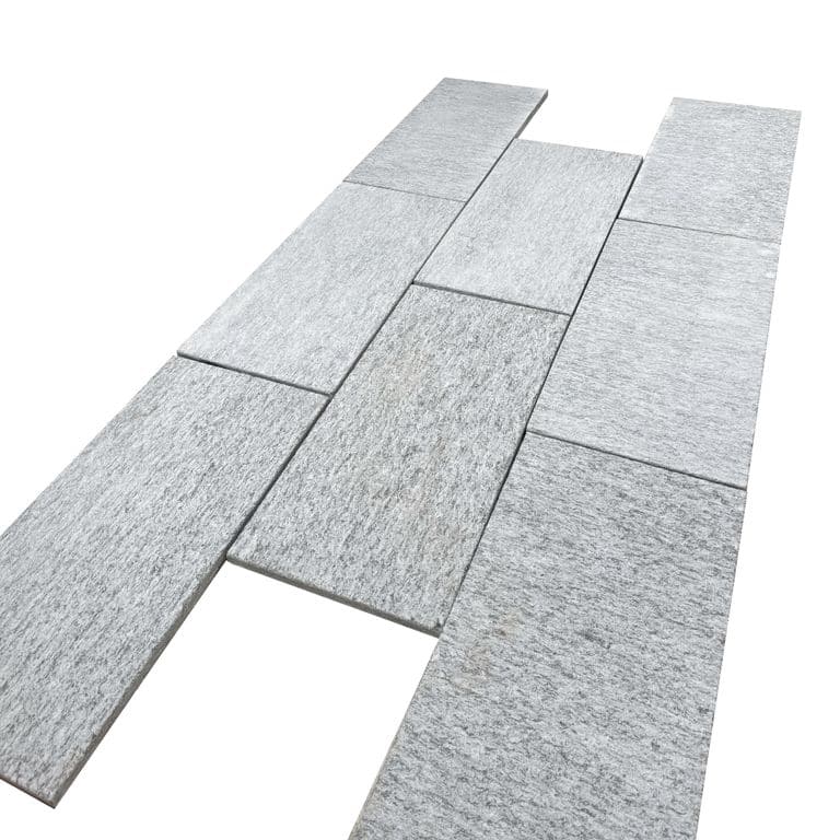 Oblique image for Pietra Italia Gneiss - Sawn Pavers. The surface finish shown is sand blasted. The dominant color shown is gray. The color mix creates a cool feeling.