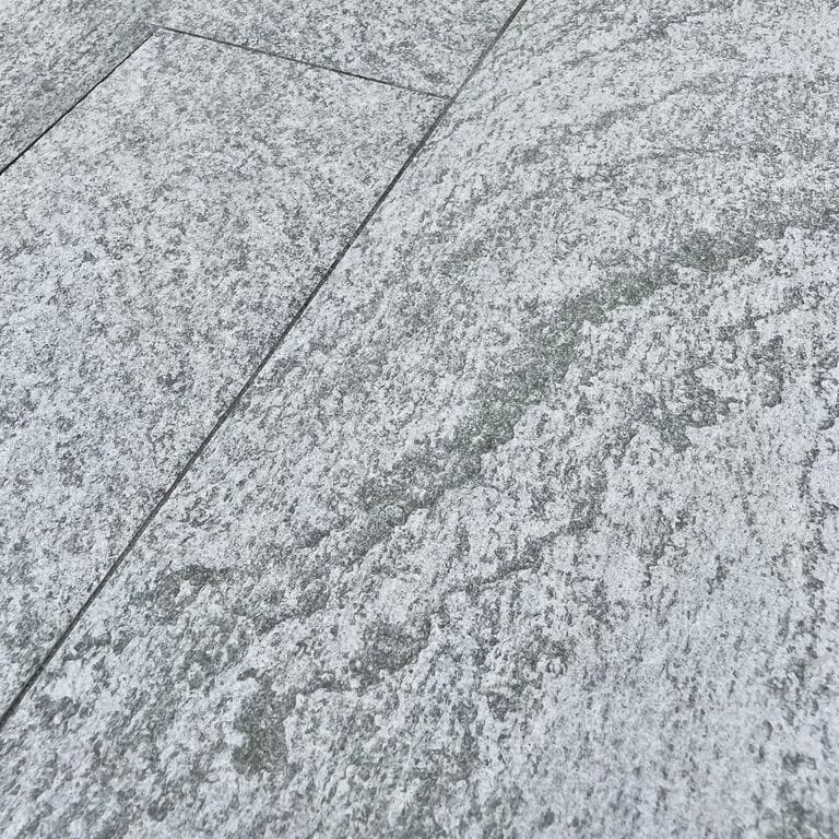 Application image for Pietra Italia Gneiss - Sawn Pavers. The surface finish shown is sand blasted. The dominant color shown is gray. The color mix creates a cool feeling.