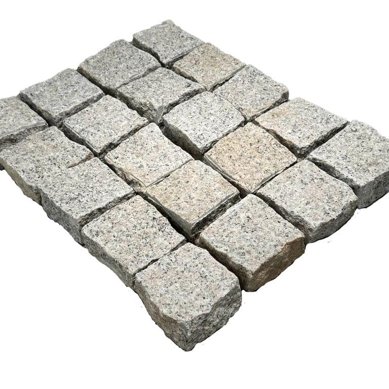 Application image for Salt &amp; Pepper Granite - Splitface Cobblestones. The dominant color shown is gray. The color mix creates a warm feeling.