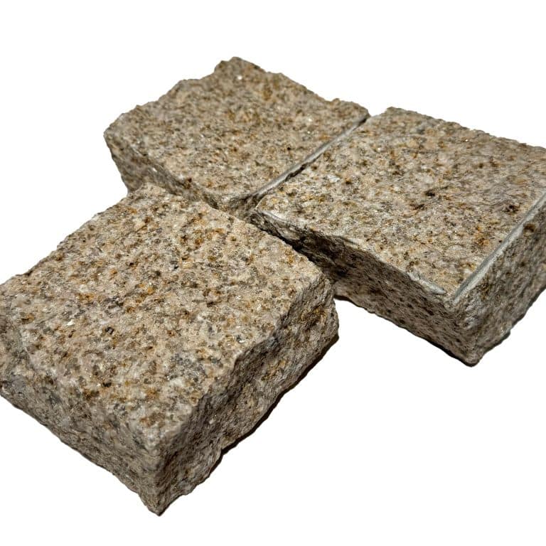 Feature image for Granite - Golden Cobblestones. The image shows this product being used for driveway pavers, path pavers, patio pavers and driveway aprons. The surface finish shown is split-face. Dominant colors shown are brown and tan. The color mix creates a warm feeling.