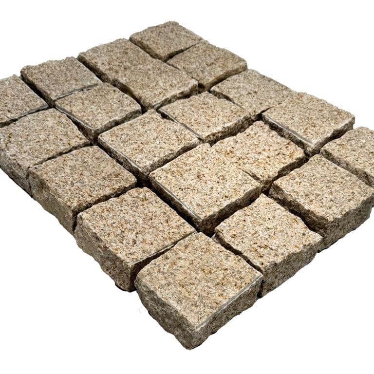 Application image for Golden Granite - Cobblestones. The surface finish shown is split-face. The dominant color shown is tan. The color mix creates a warm feeling.