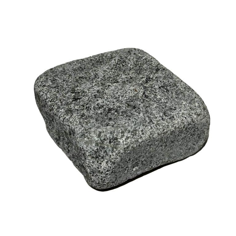 Oblique image for Zen Gray Granite - Cobblestones. The surface finish shown is . The dominant color shown is gray. The color mix creates a cool feeling.