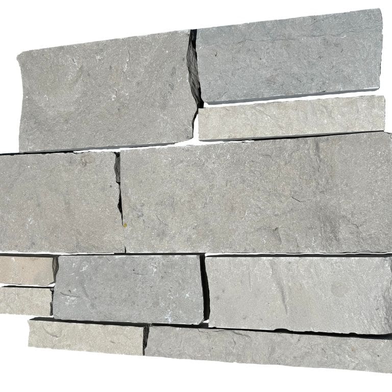 Oblique image for Lannon Gray Limestone Veneer - Splitface + Sawn. The surface finish shown is split-face. The dominant color shown is gray. The color mix creates a cool feeling.
