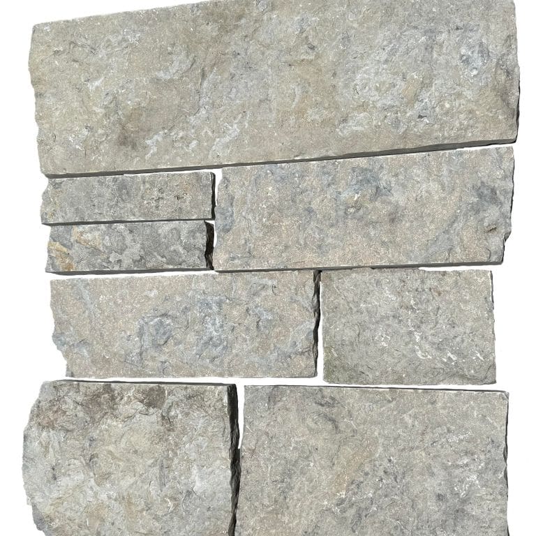 Feature image for Limestone - Rustic Gray Veneer - Splitface + Sawn. The surface finish shown is split-face. The dominant color shown is gray.