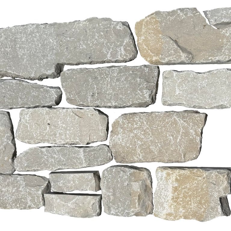 Oblique image for Lannon Gray Limestone Veneer - Splitface + Tumbled. The surface finish shown is . The dominant color shown is gray. The color mix creates a warm feeling.