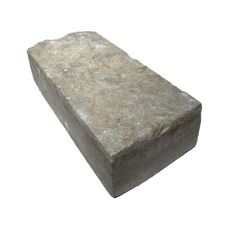 Oblique image for Reclaimed Rochester Limestone - Pavers. The surface finish shown is split-face. The dominant color shown is gray. The color mix creates a warm feeling.