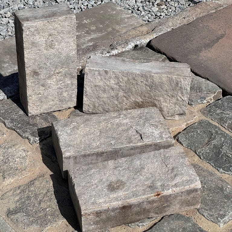 Application image for Reclaimed Rochester Limestone - Pavers. The surface finish shown is split-face. The dominant color shown is gray. The color mix creates a cool feeling.