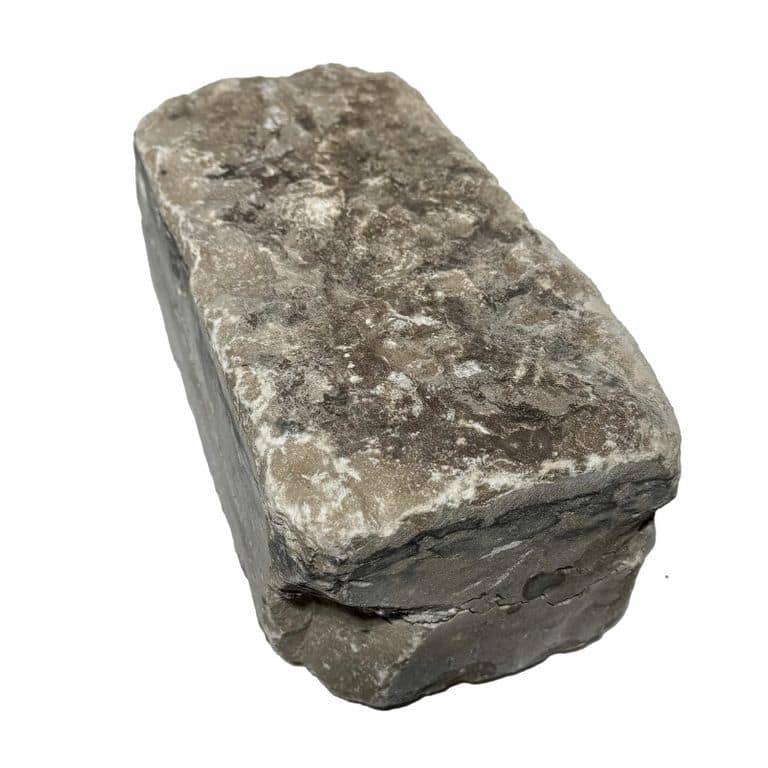 Best close-up image for Madison Limestone Cobblestones - Split Top/Botton, Sawn Sides. The surface finish shown is . Dominant colors shown are brown and gray. The color mix creates a warm feeling.