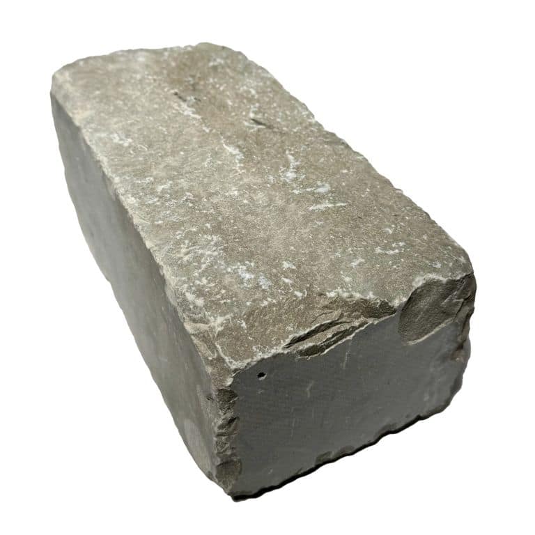 Oblique image for Madison Limestone Cobblestones - Split Top/Botton, Sawn Sides. The surface finish shown is . The dominant color shown is gray.