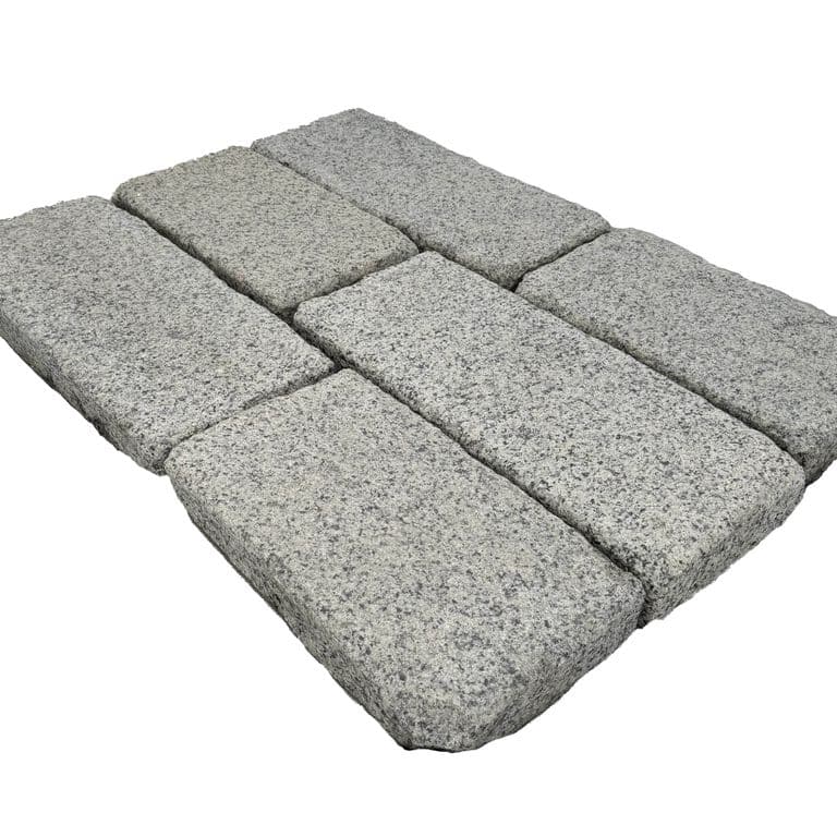 Feature image for Granite - Reclaimed Rockport Antiqued Plank Pavers. The dominant color shown is gray. The color mix creates a cool feeling.