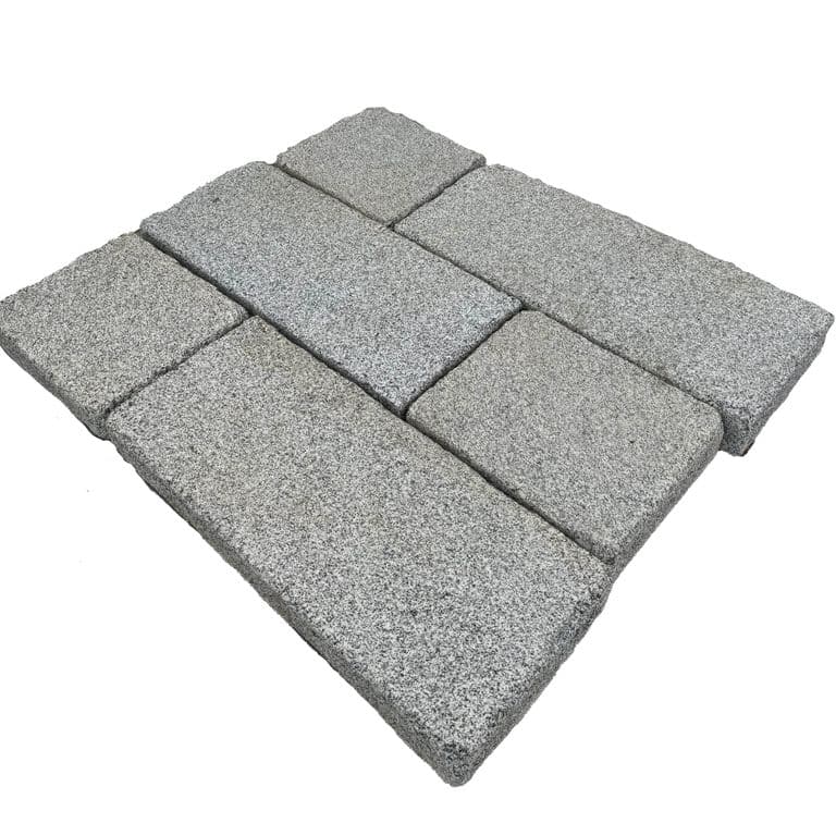 Feature image for Granite - Dodlin Hill - Antiqued Plank Pavers. The dominant color shown is gray. The color mix creates a cool feeling. Fine speckled color pattern.