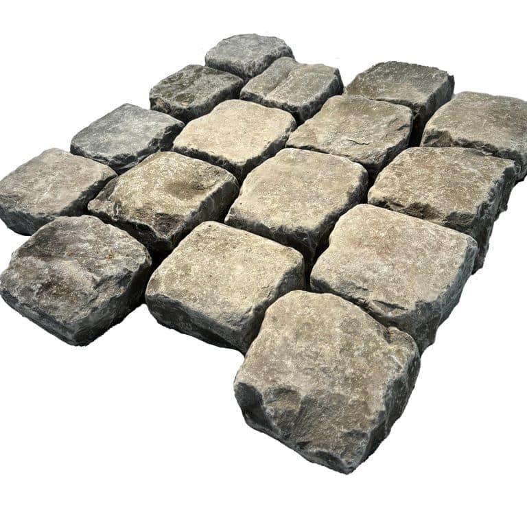 Oblique image for Reclaimed European Porphyry Cobblestones - Square - Antiqued. The surface finish shown is . Dominant colors shown are beige, gray and tan. The color mix creates a warm feeling.