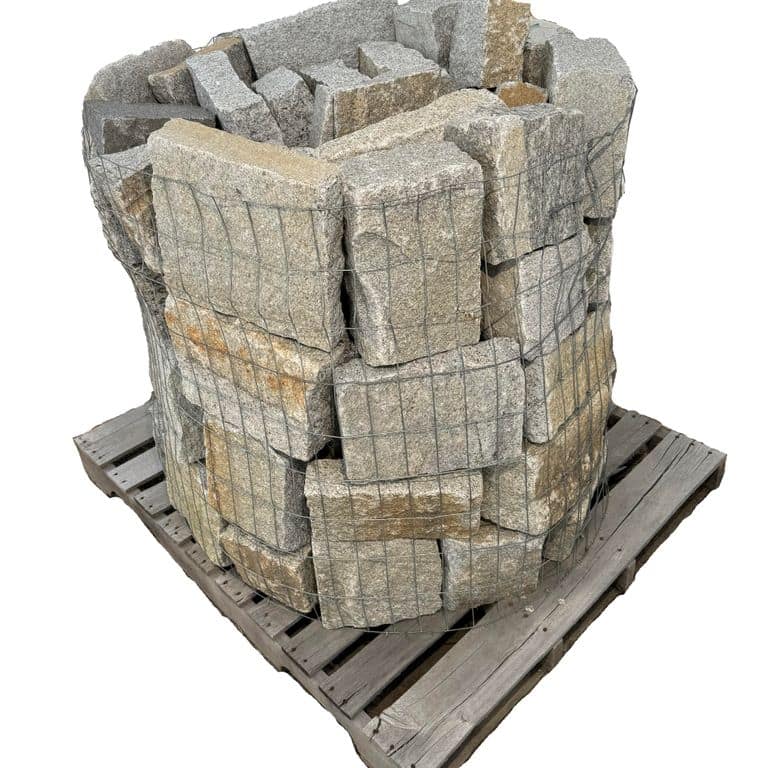 Oblique image for Granite - Reclaimed Full Bed Veneer - Squares and Rectangles. The surface finish shown is natural. The dominant color shown is gray. The color mix creates a warm feeling.